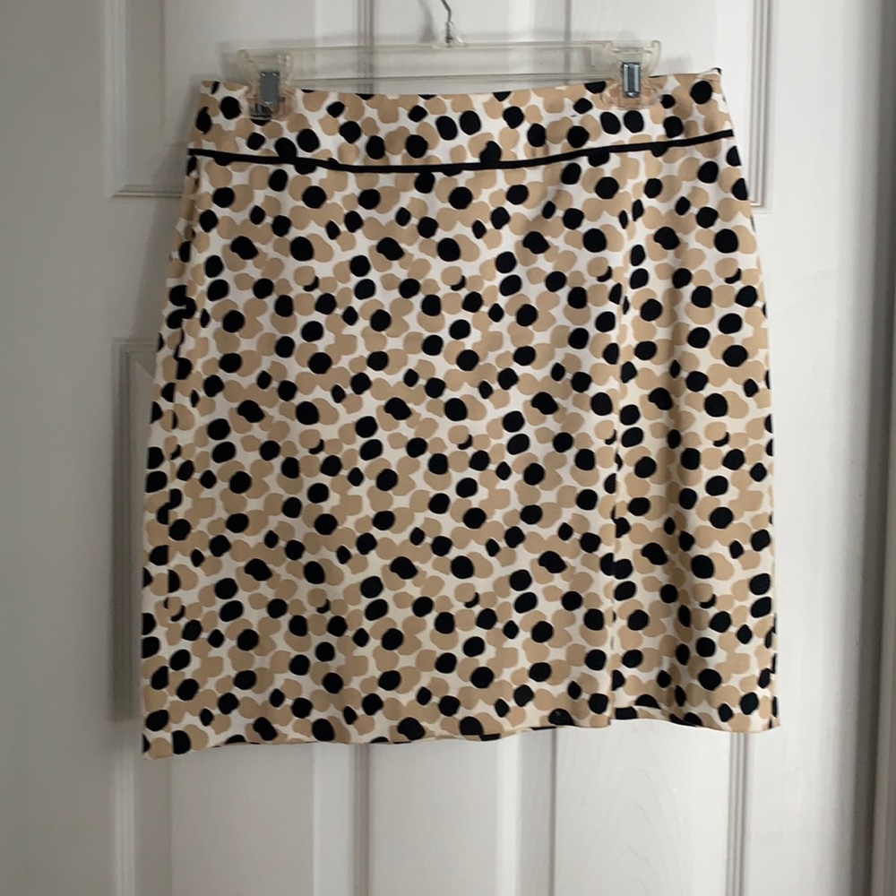 Street has skirt.  Hits about 3” above knee